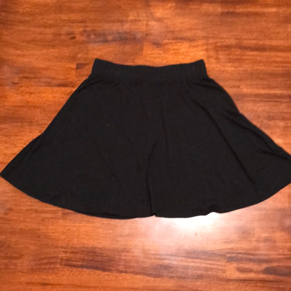 Black cotton circle skirt.